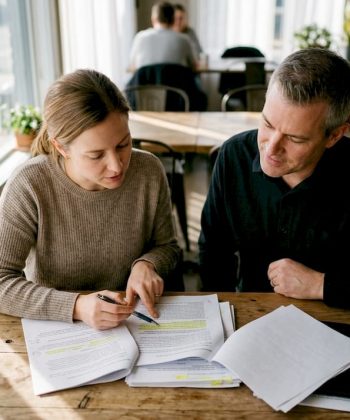 Parent and teacher discussing autism communication
