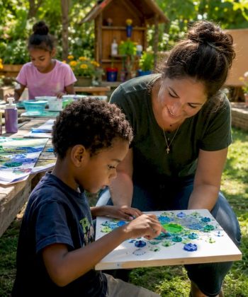 Teacher engaging autistic children in classroom