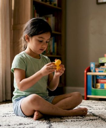 Child rocking during stimming behavior at home